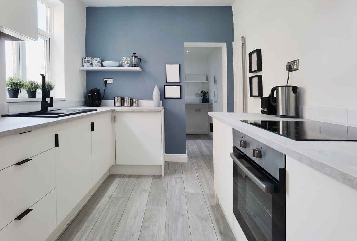 white-cupboards-grey-wall